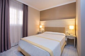 dormitorio Apartamento Superior en Iberostar Málaga Playa